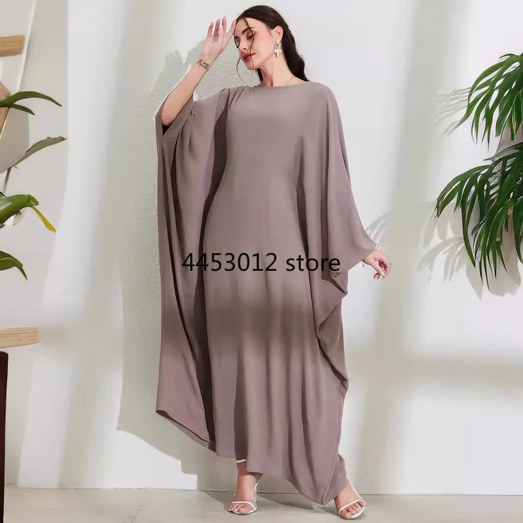 Moyen-Orient arabe musulman nouvelle mode femmes couleur unie décontracté à la mode élégant ample manches chauve-souris robes femmes vêtements Abaya
