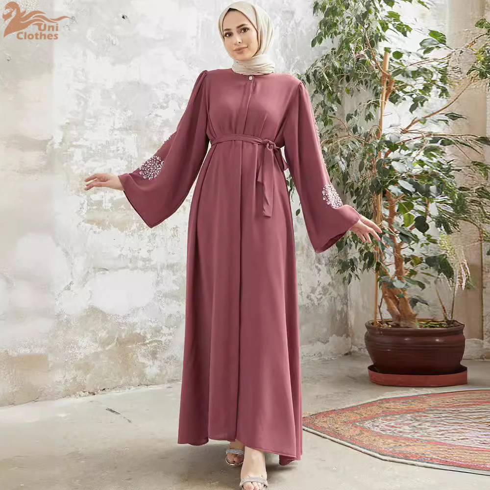 Robe Ample Rose Pale Fleurs BLanches Poignets Manches Larges Ceinture Assortie Fete Traditionnelle Ramadan Aid Dubai